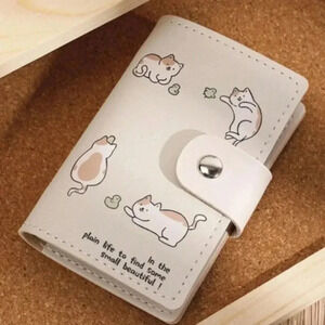 Cream colored wallet with small kitties ducks plain life find small beauties